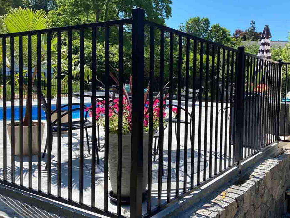 Residential ornamental steel fence installation for the Southeastern Massachusetts area.