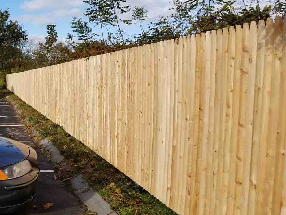 Plymouth MA stockade style wood fence