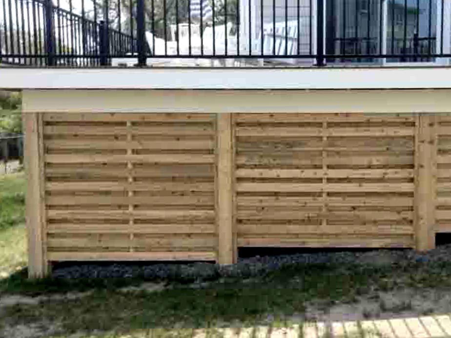 Sandwich MA Shadowbox style wood fence